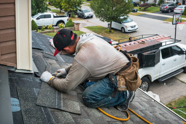 Professional Roof Replacement technician working in Mount Sinai, NY
